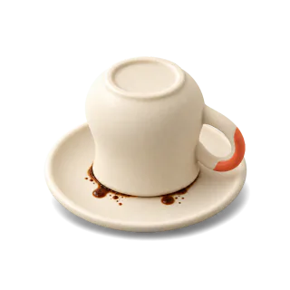 A coffee cup turned upside down onto its saucer